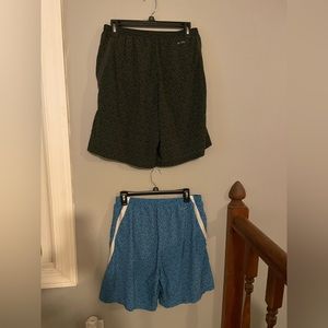 2 pairs of Nike running shorts